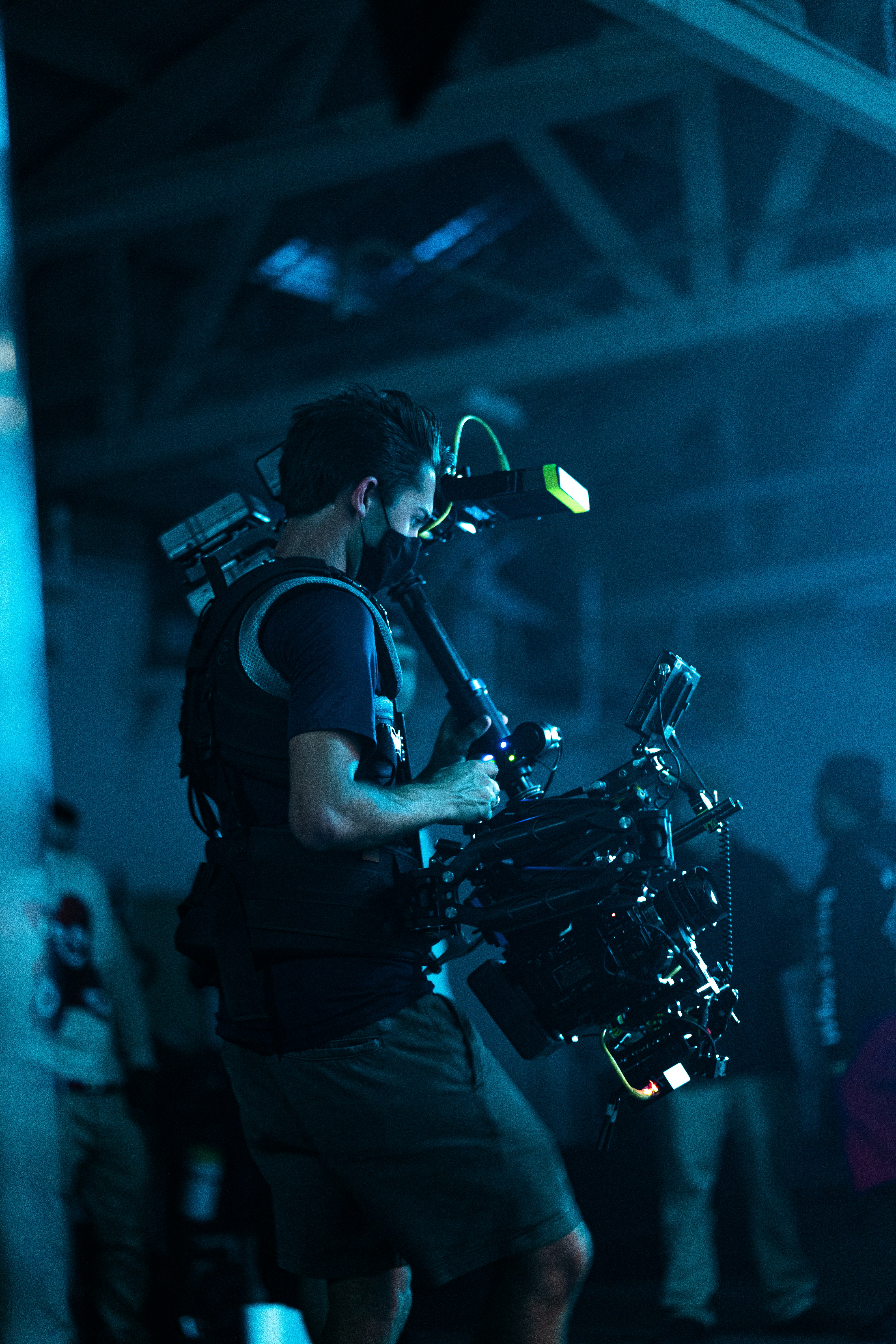 man in black t-shirt playing drum set